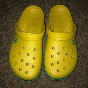 Yellow and green Crocs
